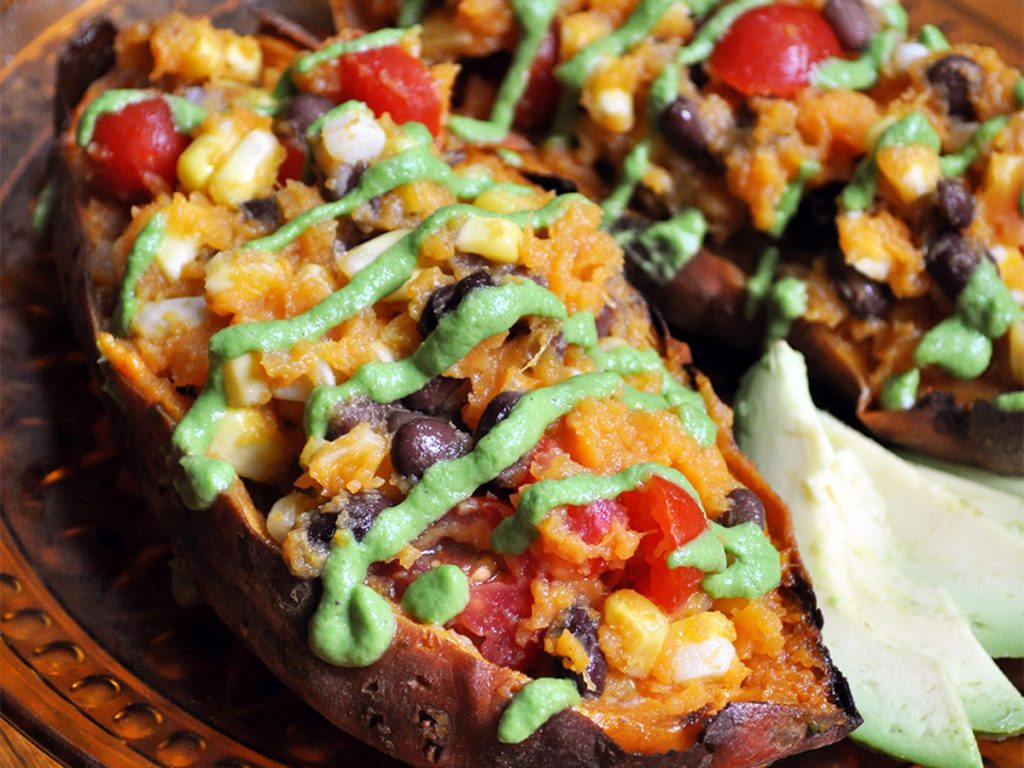 Foil wrapped baked sweet potatoes and chili edited